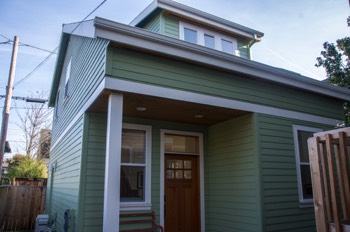  SW Portland Custom home: Main Floor living with flexible spaces on upper level. Wood shop next to garage. 	 